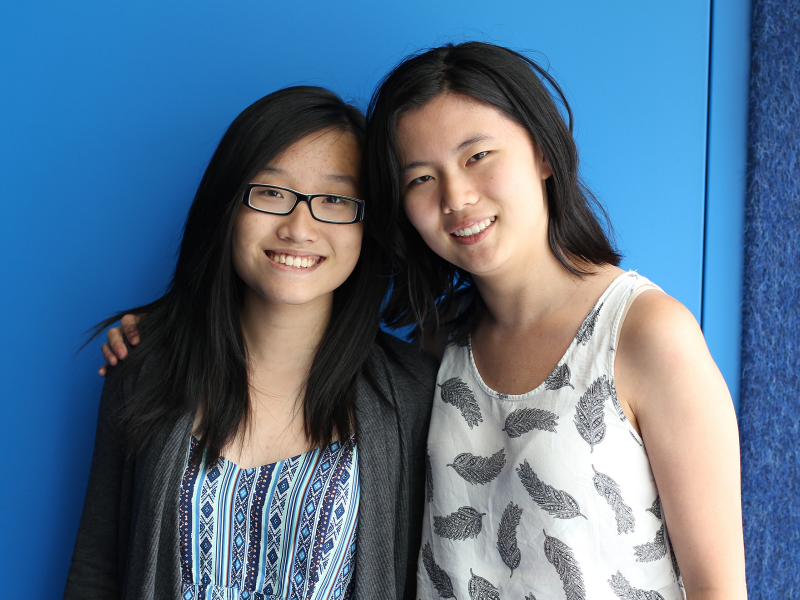 Photo of two students smiling.